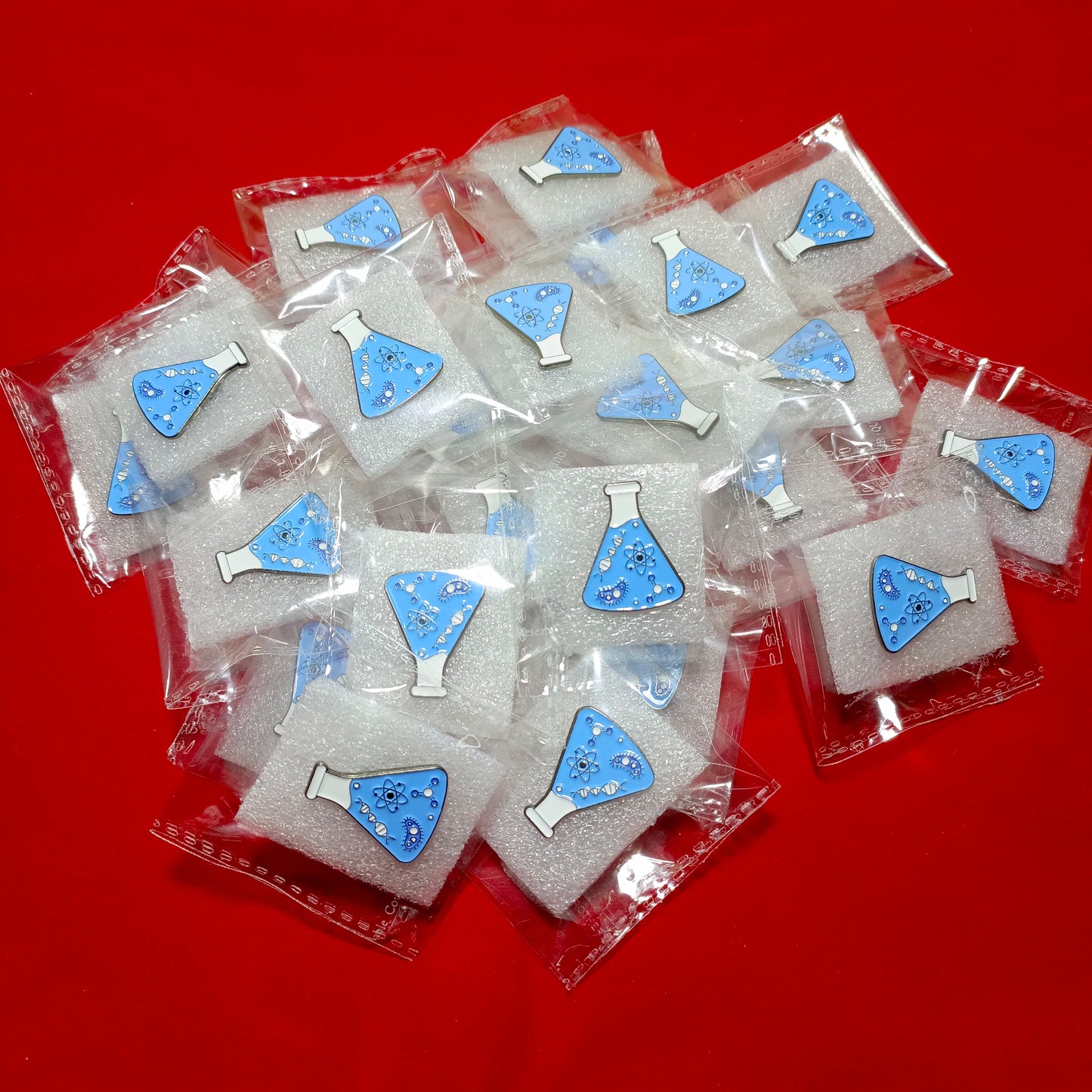 Lapel pins of blue beaker