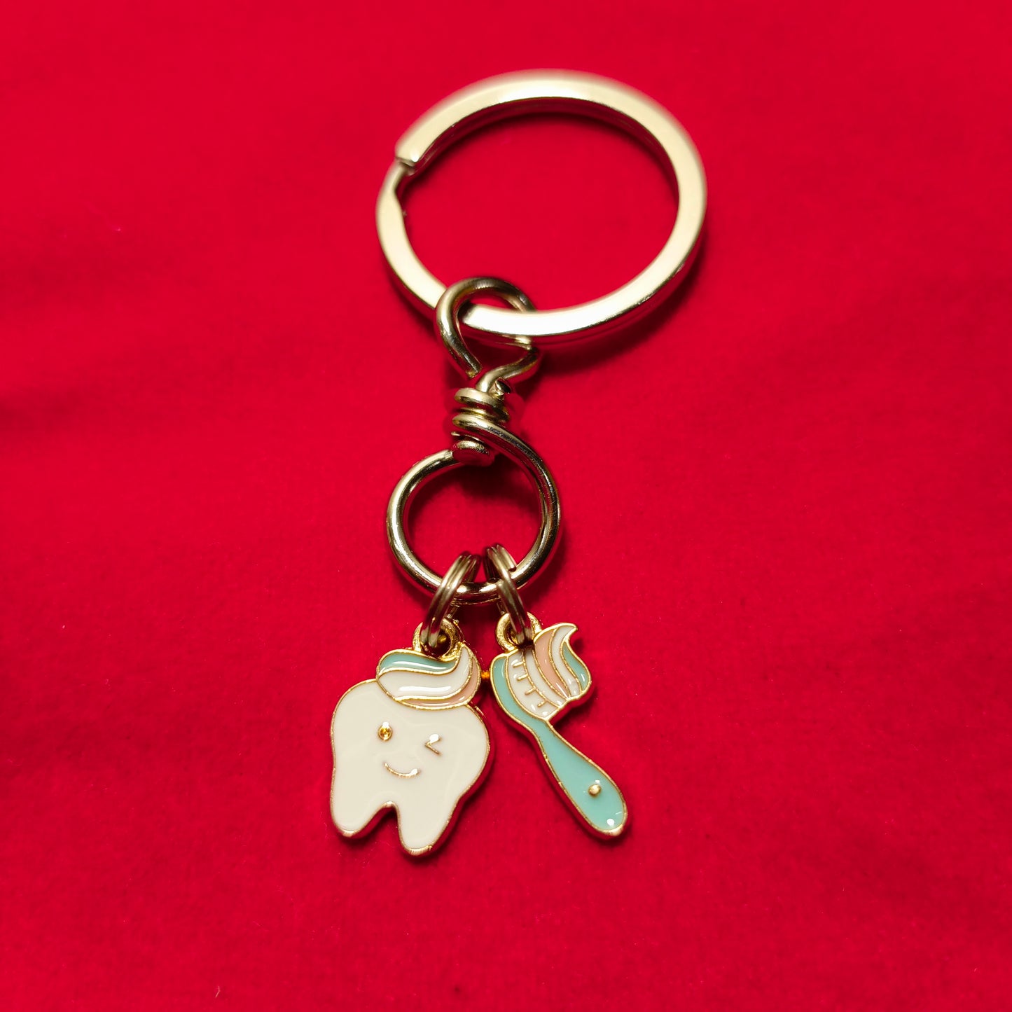 Keychain of tooth & brush enamel filled