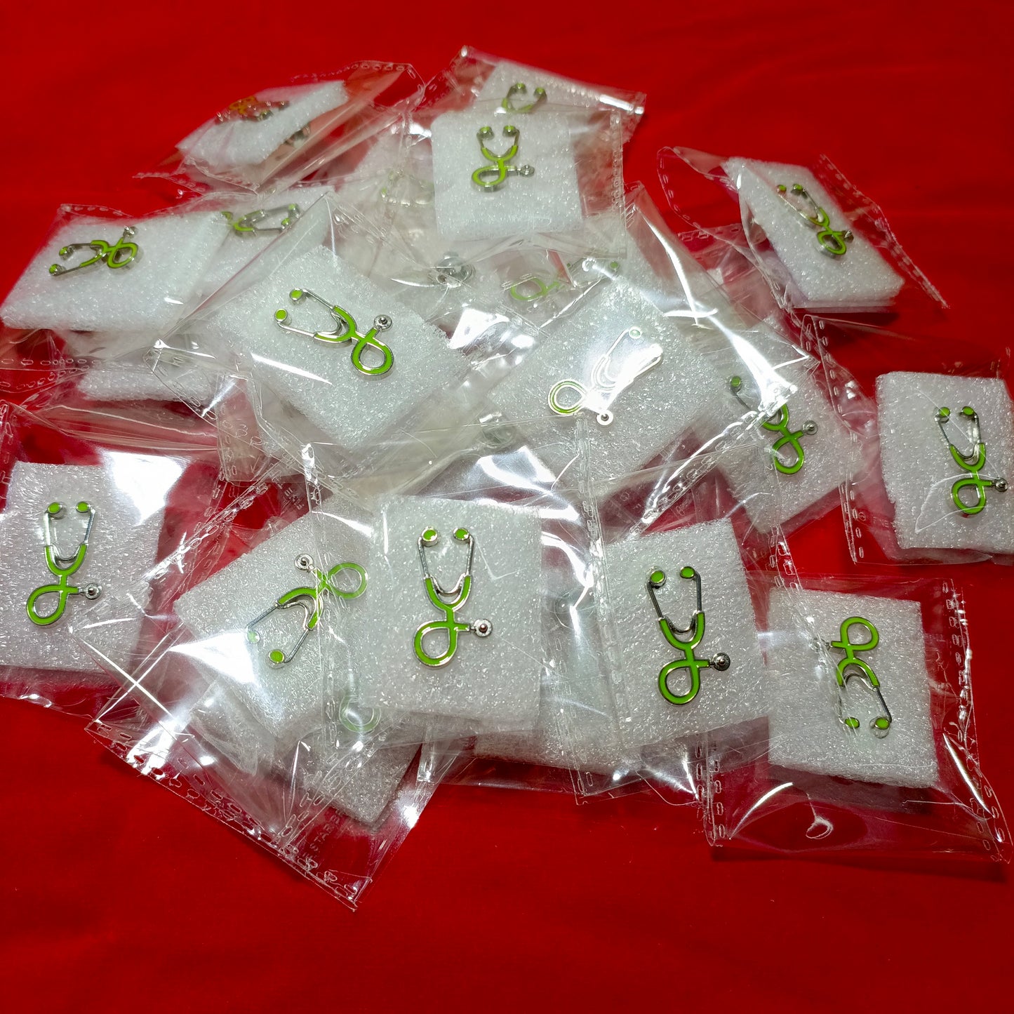 Lapel pins of stethoscope green