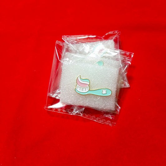Lapel pins of toothbrush