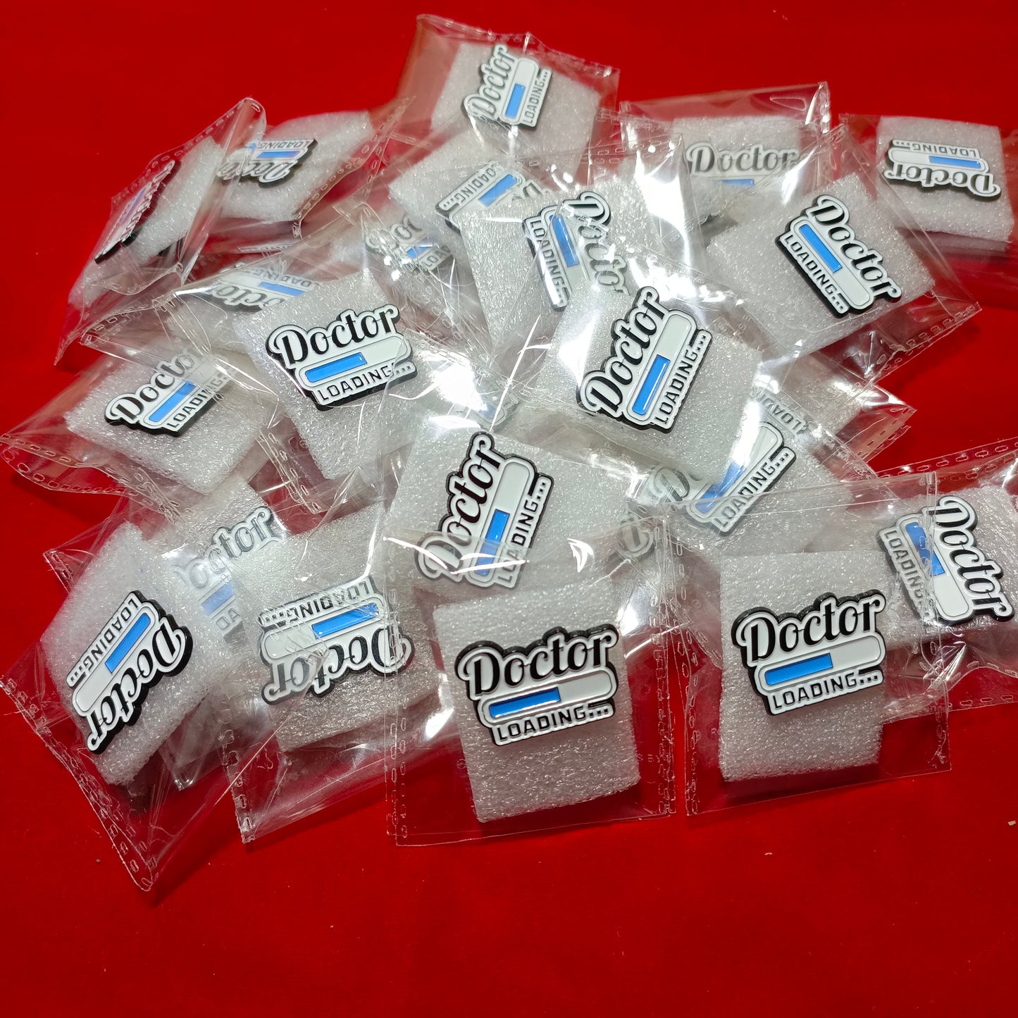 Lapel pins of Doctor Loading